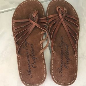 Brown leather slipper sandals.