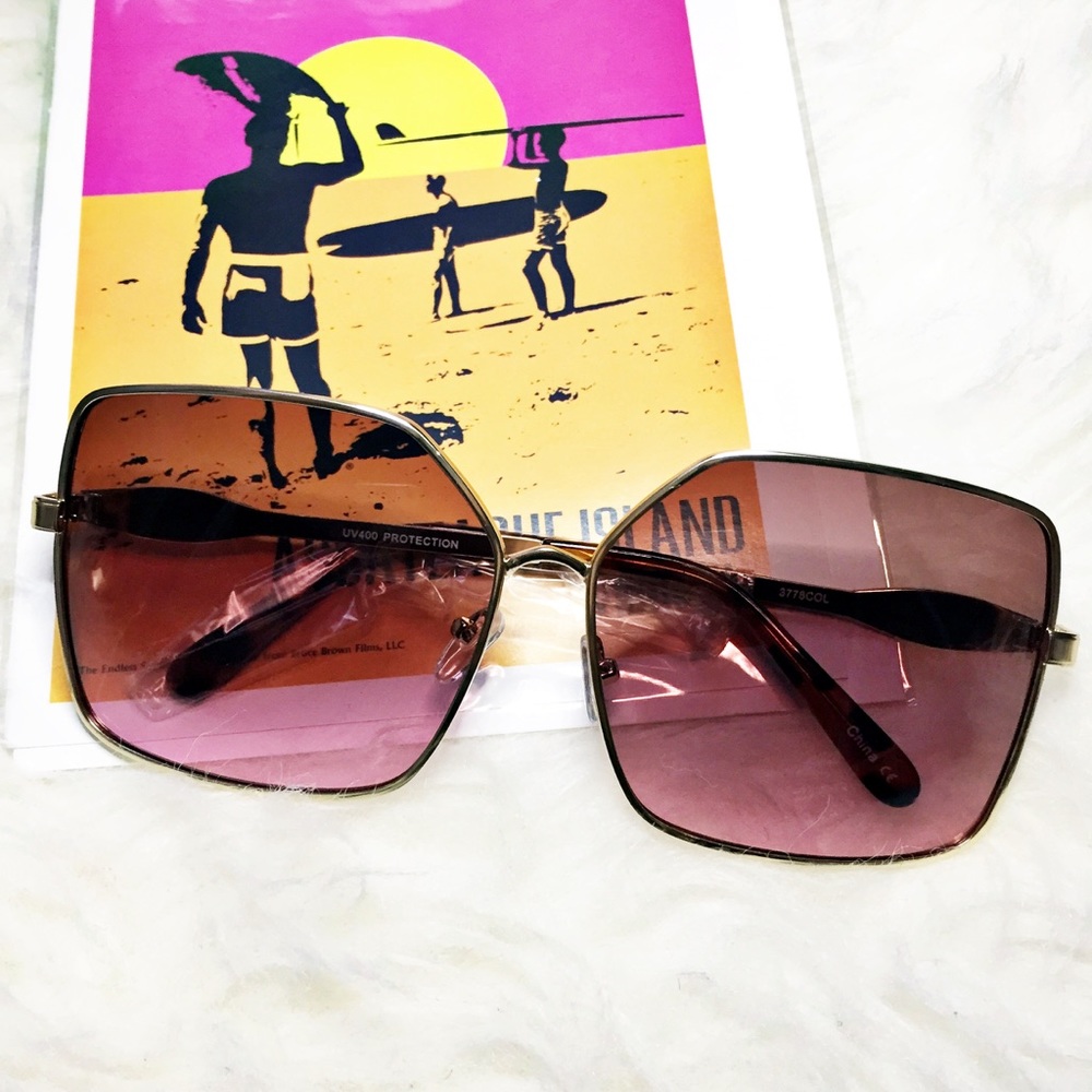 Brown ombre lens with gold trim sunglasses