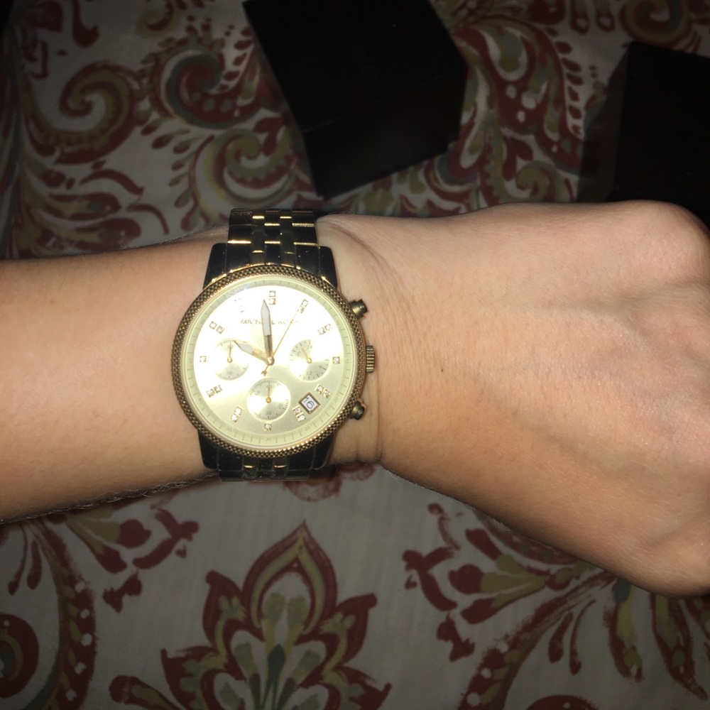Like new gold Michael kors watch.