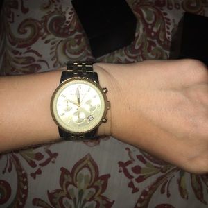 Like new gold Michael kors watch.