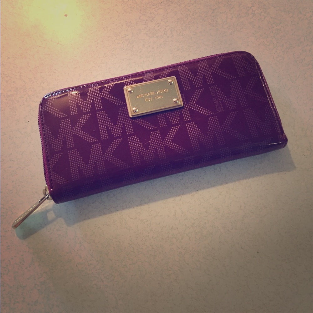 Michael Kors wallet, burgundy, lightly used.