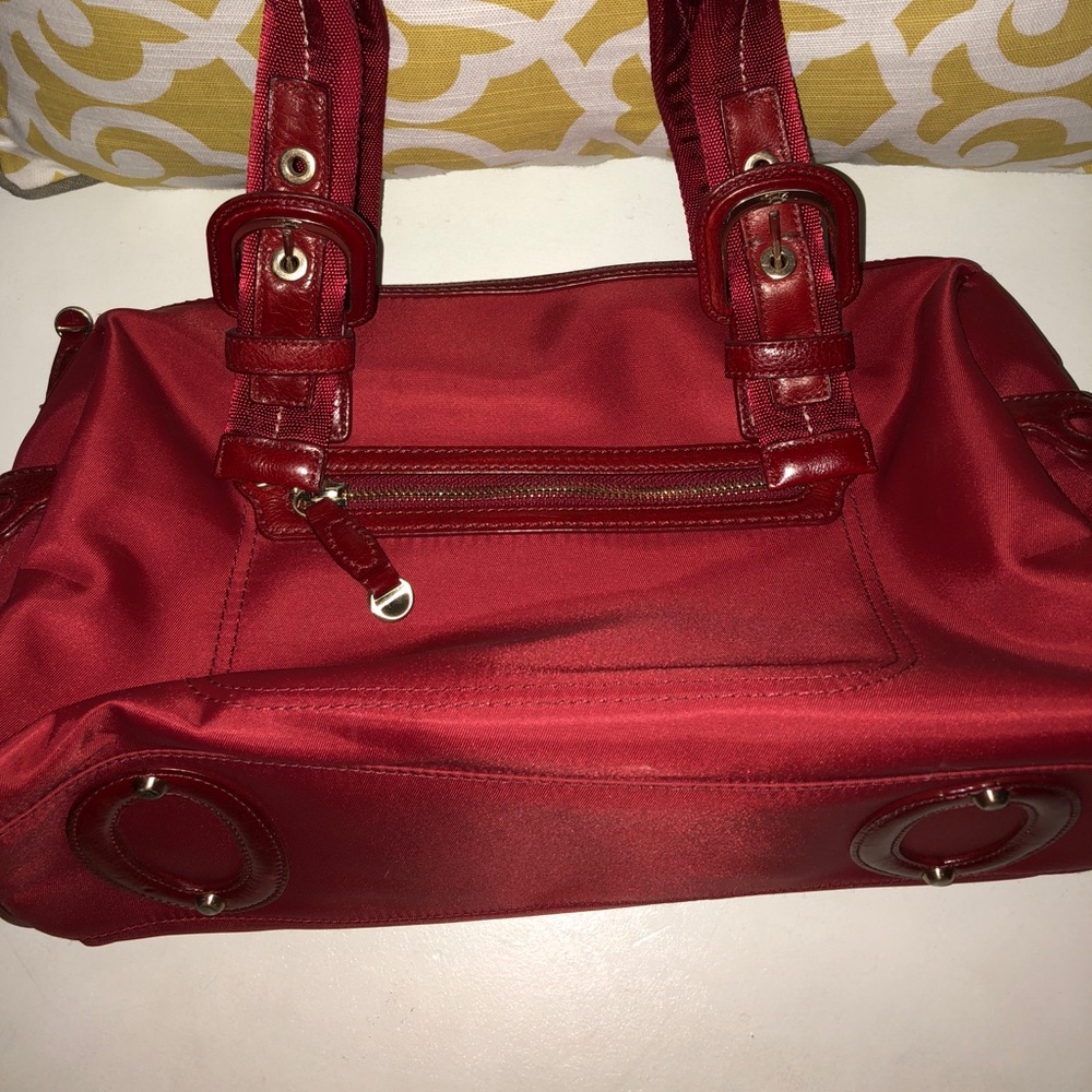 Tumi red purse