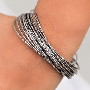 Silver colored attached bangle bracelet set