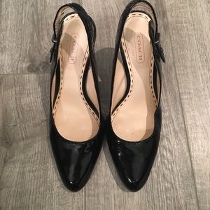 Patent leather Coach heels with sling back.