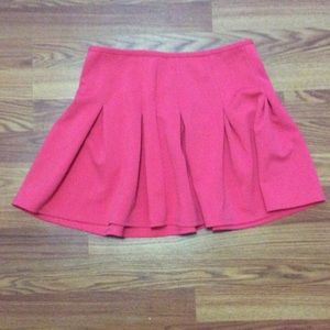 Pink pleated skater skirt