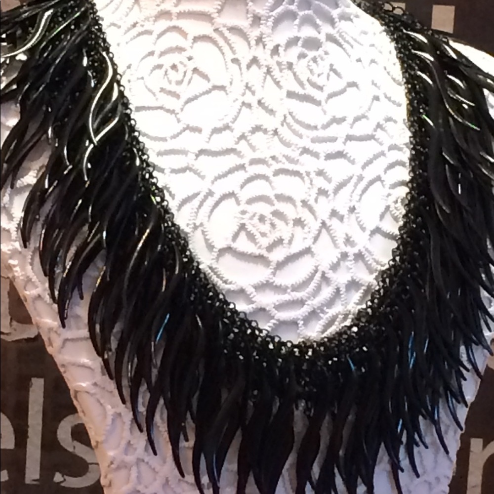 High gloss, high fashion statement necklace