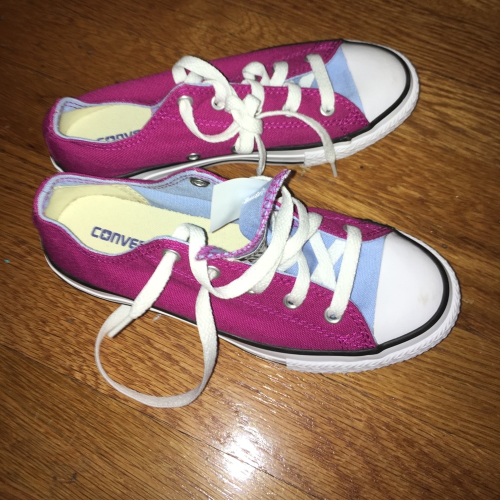 Dark purple and light blue low top converse
