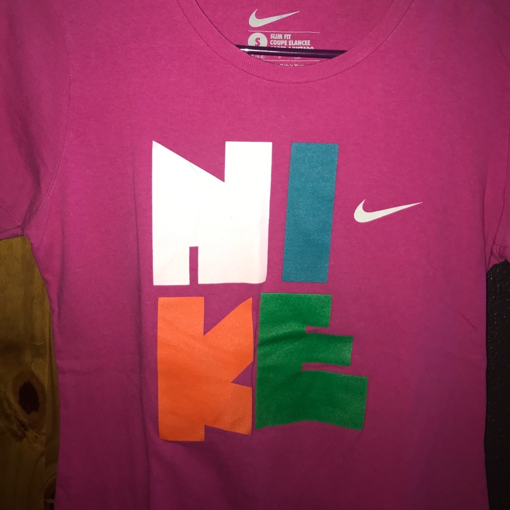 A pink nike shirt