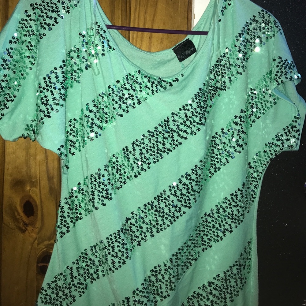 A sparkly mint day trip tee shirt