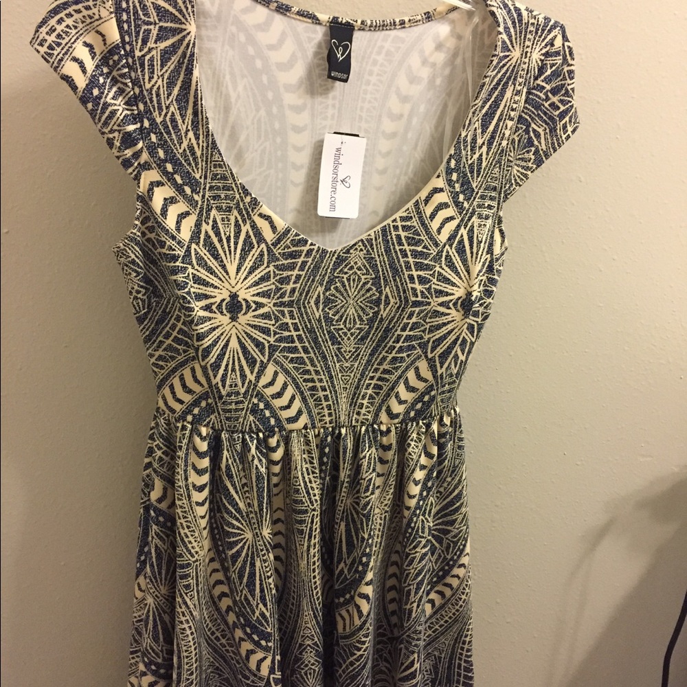 Blue and cream patterned flowy dress.
