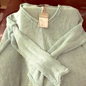 Wooden Ship V-neck sweater