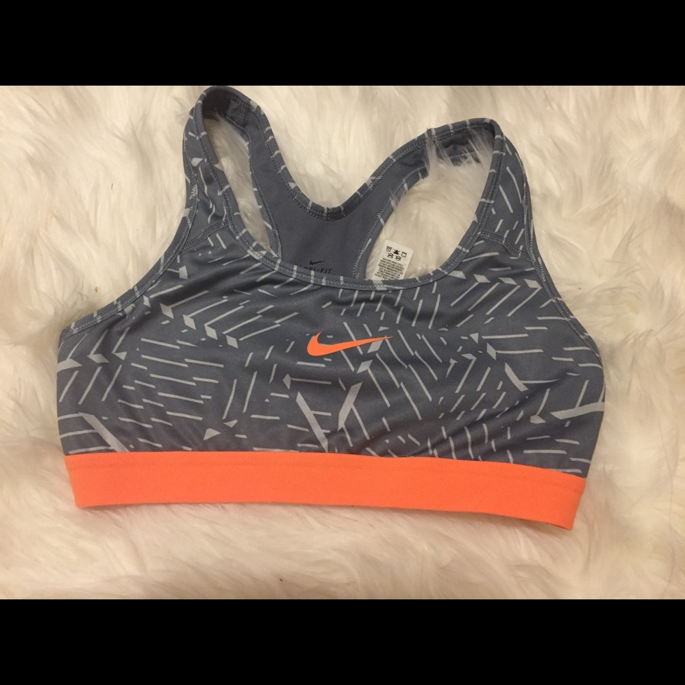 Grey and orange patterned sports bra