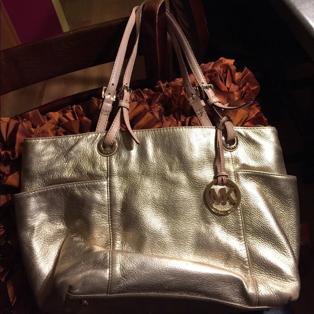 Michael Kors metallic gold handbag