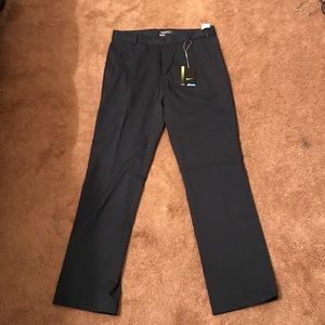 Brand new Nike golf dry fit pants. Size 32x33.