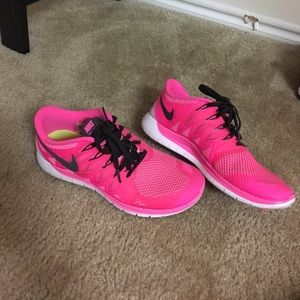 Bright pink Nike Free 5.0