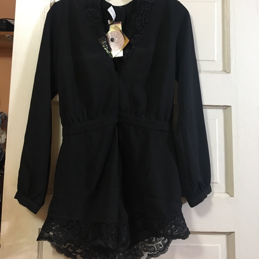 Kittenish black lace romper Jessie James decker