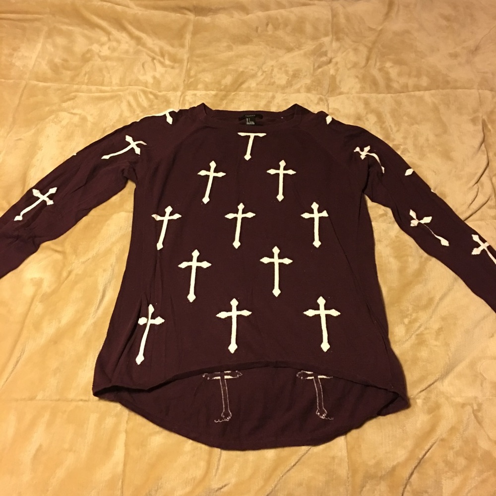 Maroon sweater with cross design