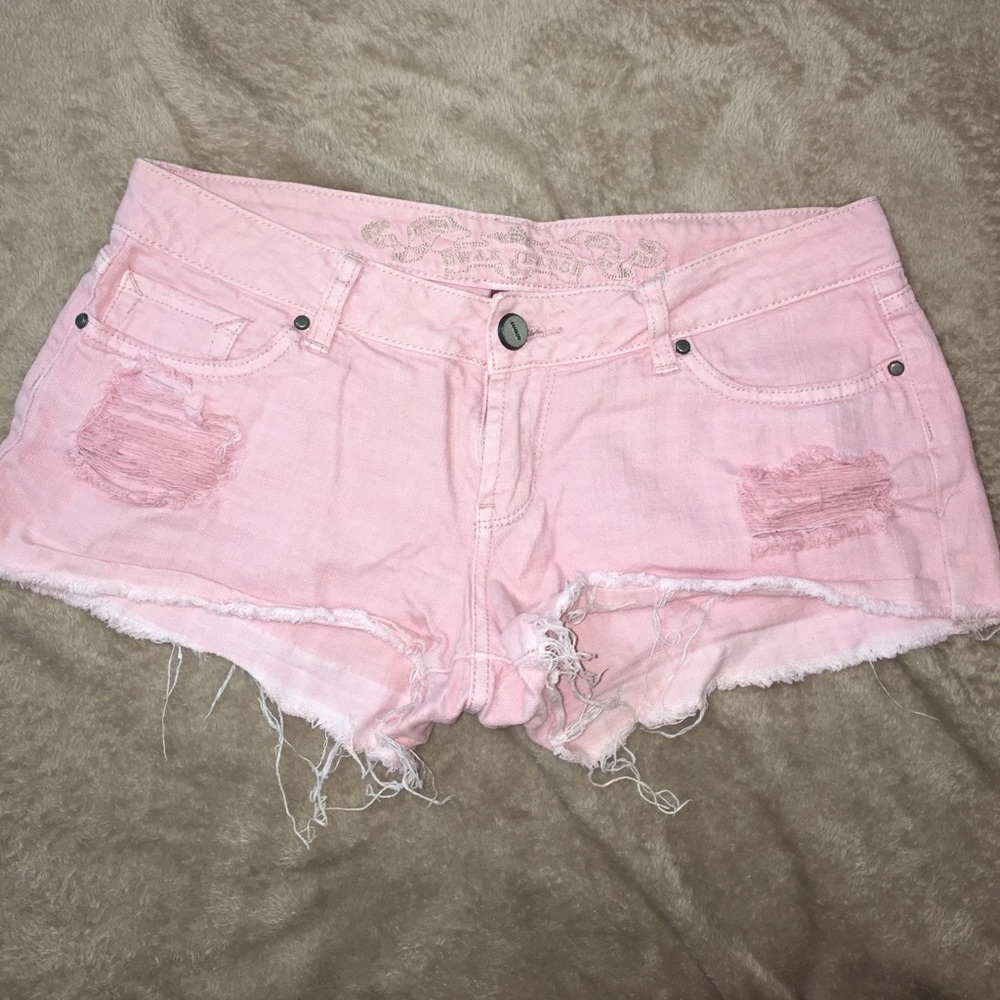 Pink distressed jean shorts