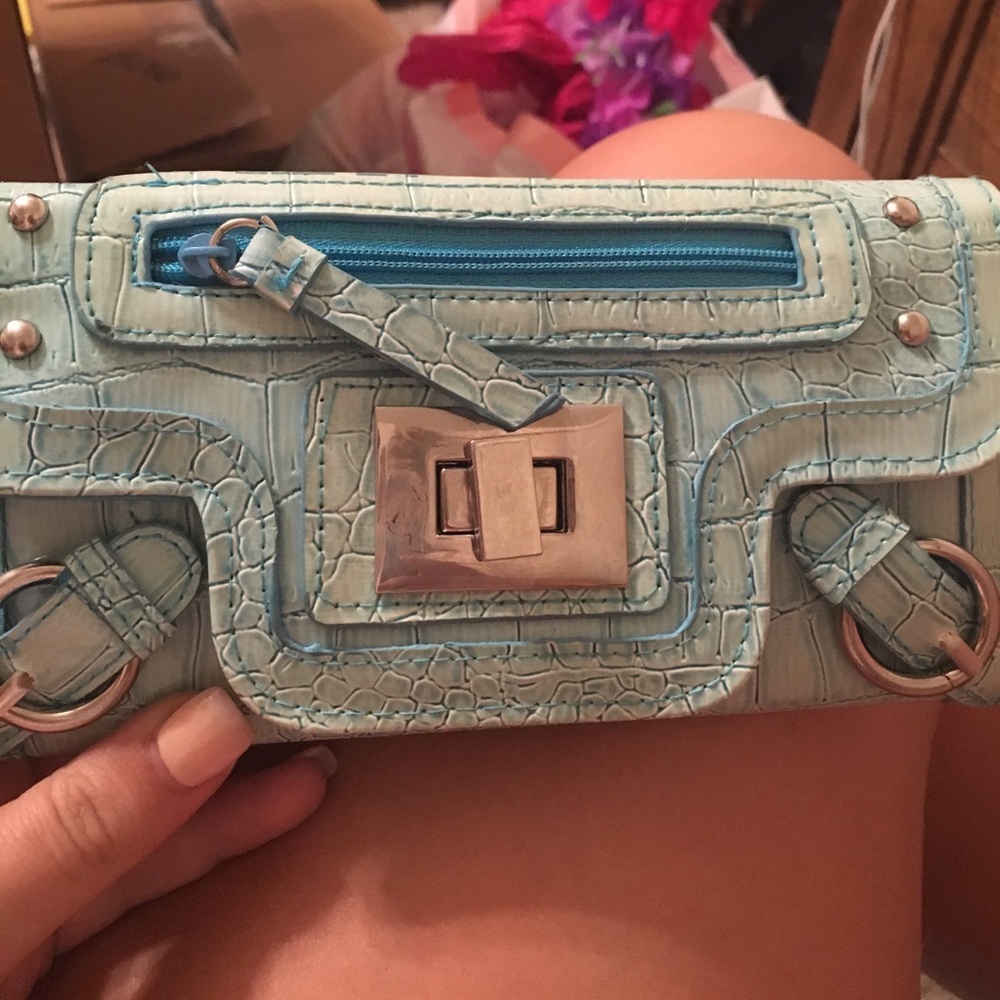 blue claire’s icing wallet