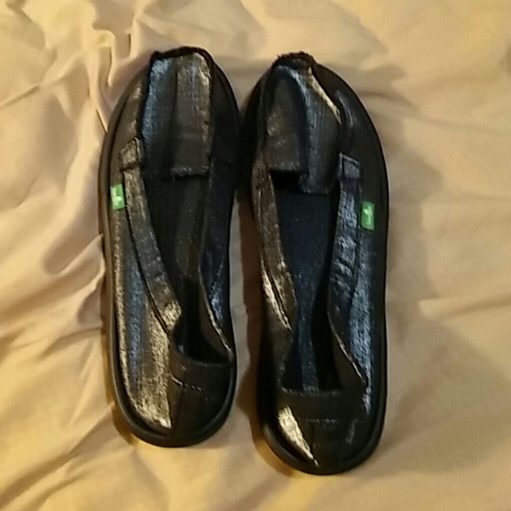 Sanuk black slip ons