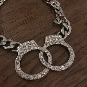 Silvertone handcuff necklace with rhinestones