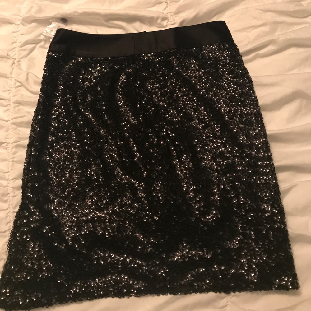 Black pencil skirt..  the limited