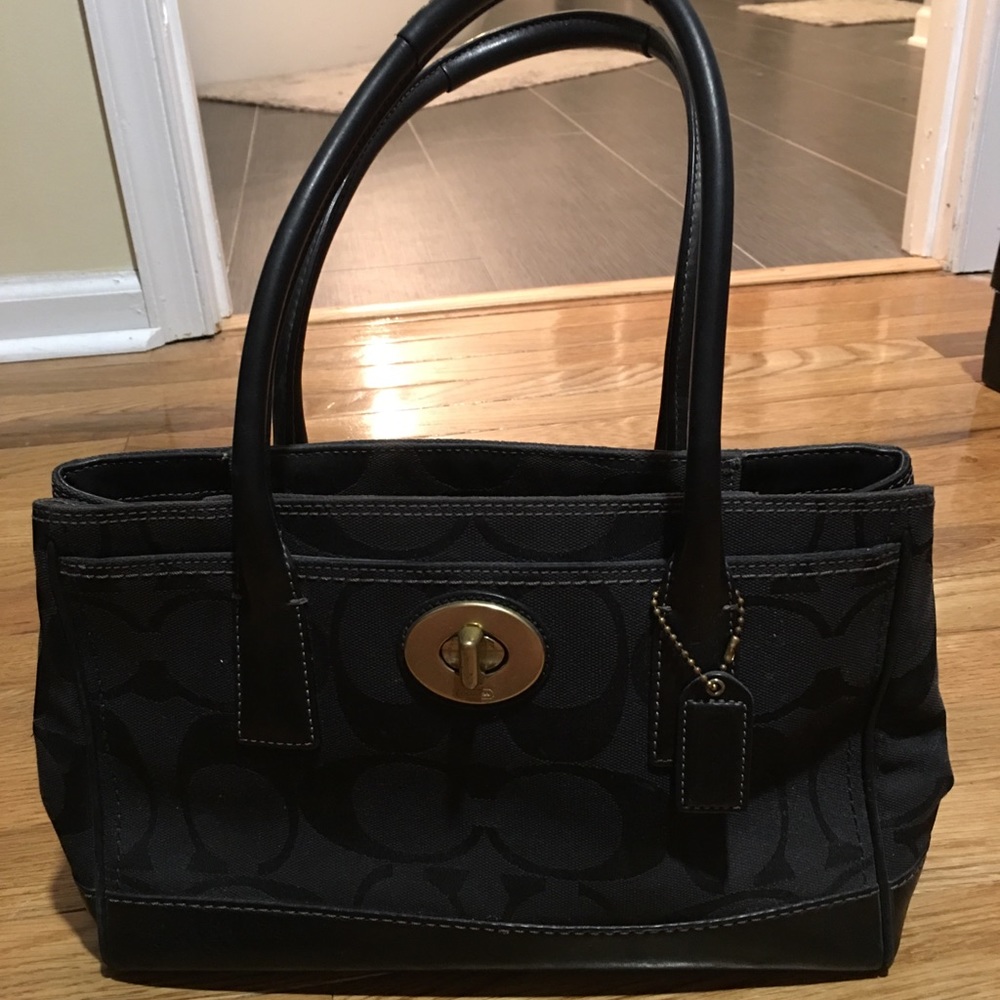 Black and gold coach purse