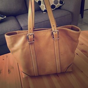 Used coach tan leather bag.