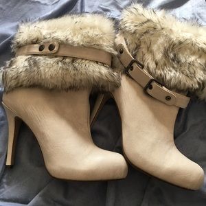 Worn once heeled boots