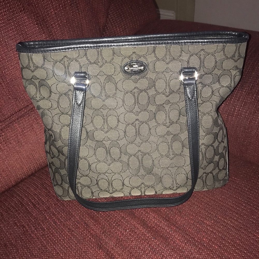Coach pocket book