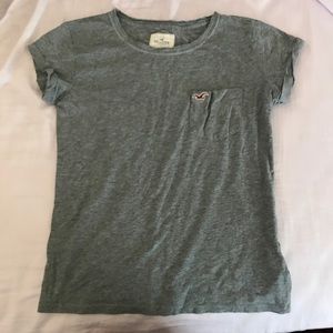 Grey basic tee with pocket. Size medium. Like new