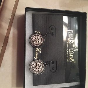 Black and silver round earrings