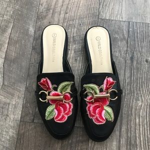 Black embroidered mules