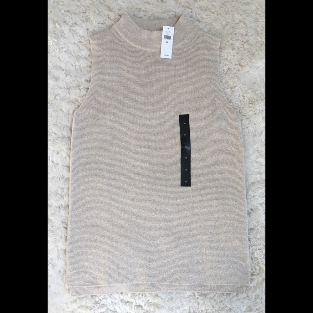 Mock neck, sleeveless sparkly top!