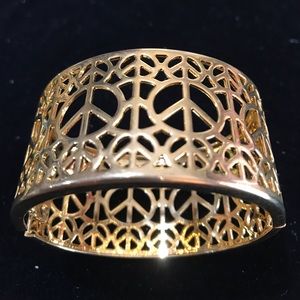 Gold toned hinged Peace sign bracelet NWOT
