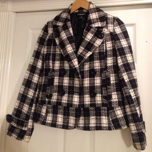 Black, cream, hints of tan jacket