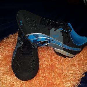 Black and Blue mens Puma tennis shoes
