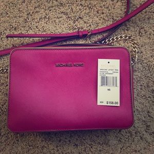 Michael kors fuschia jet set