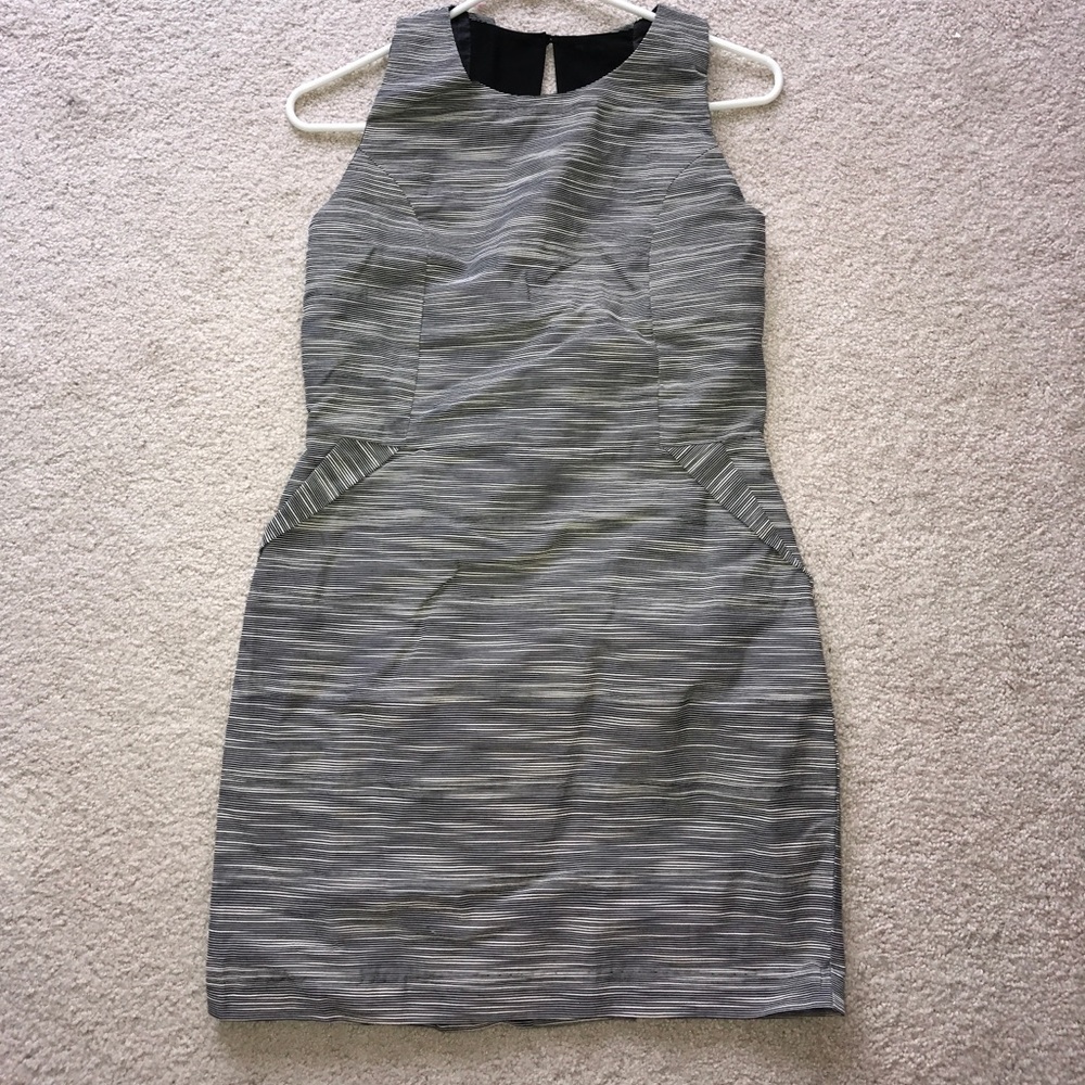 Black and cream dress with pockets! Make an offer!