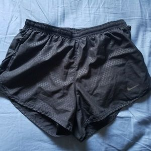Black Nike running shorts