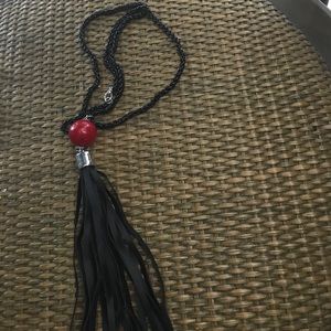 Black tassel necklace with red ball