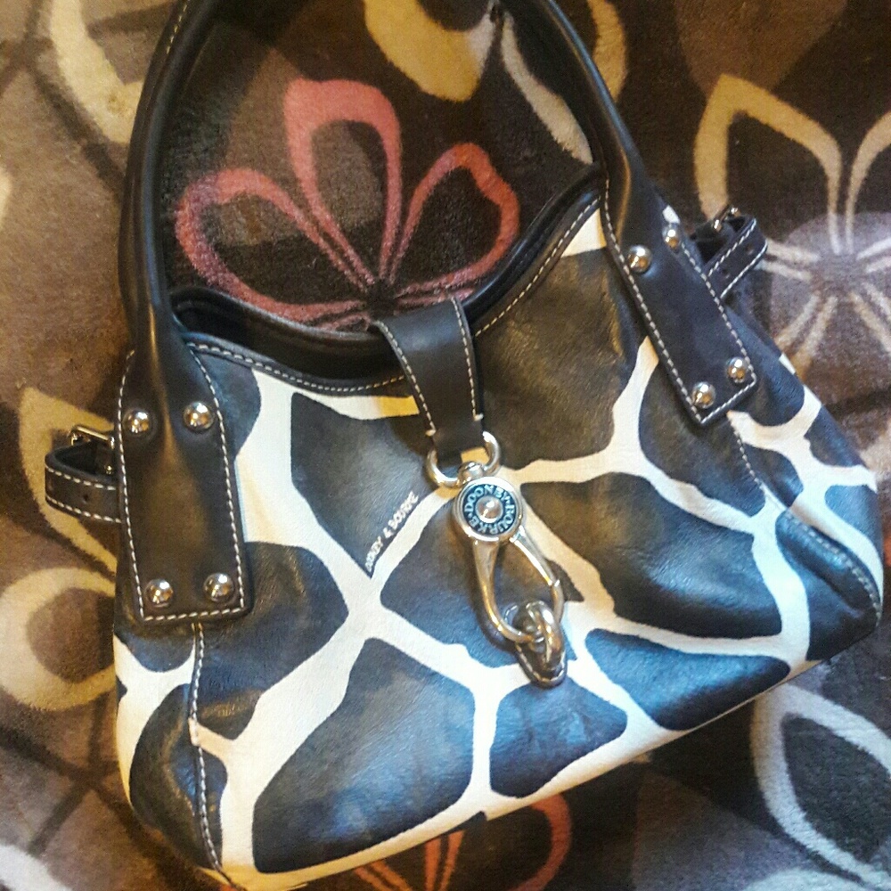 **SOLD**DOONEY AND BOURKE LOGO LOCK HANDBAG