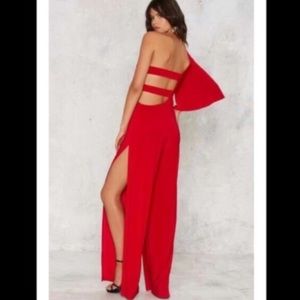 Red jumpsuit by Nasty Gal