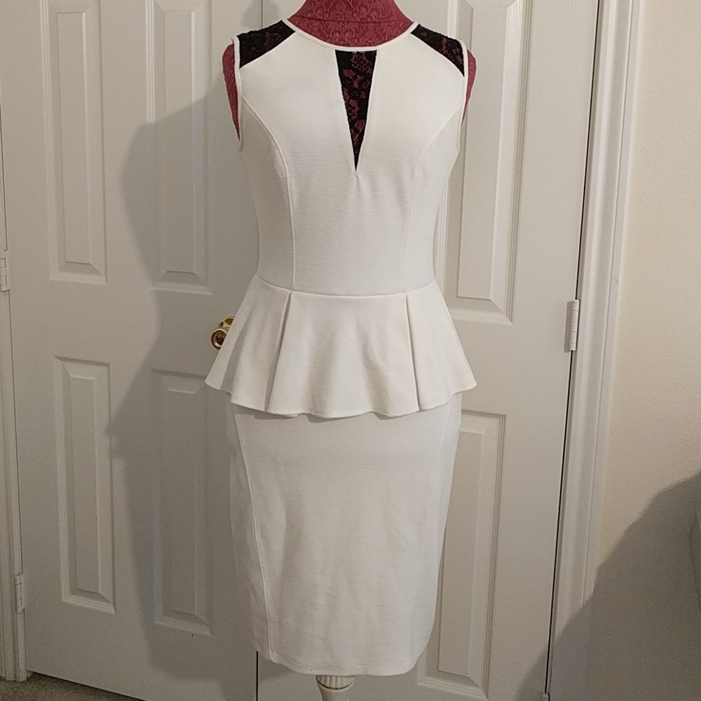 White peplum dress with black lace inserts