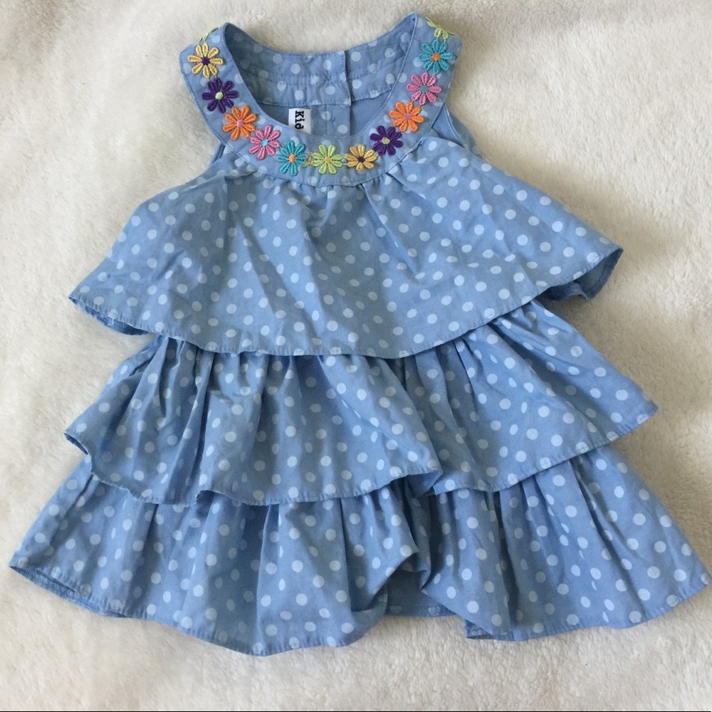 Ruffled blue polka dot blouse for little girls