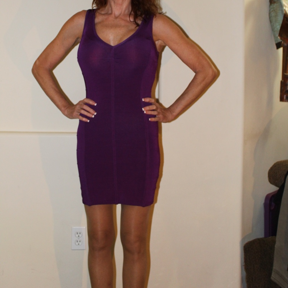 Purple mini by Bebe size medium