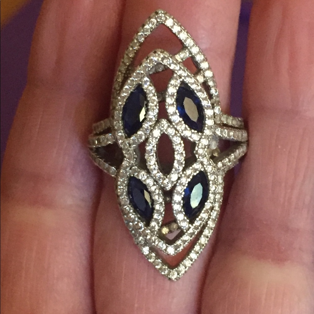 Blue Sapphire with diamond accents ring