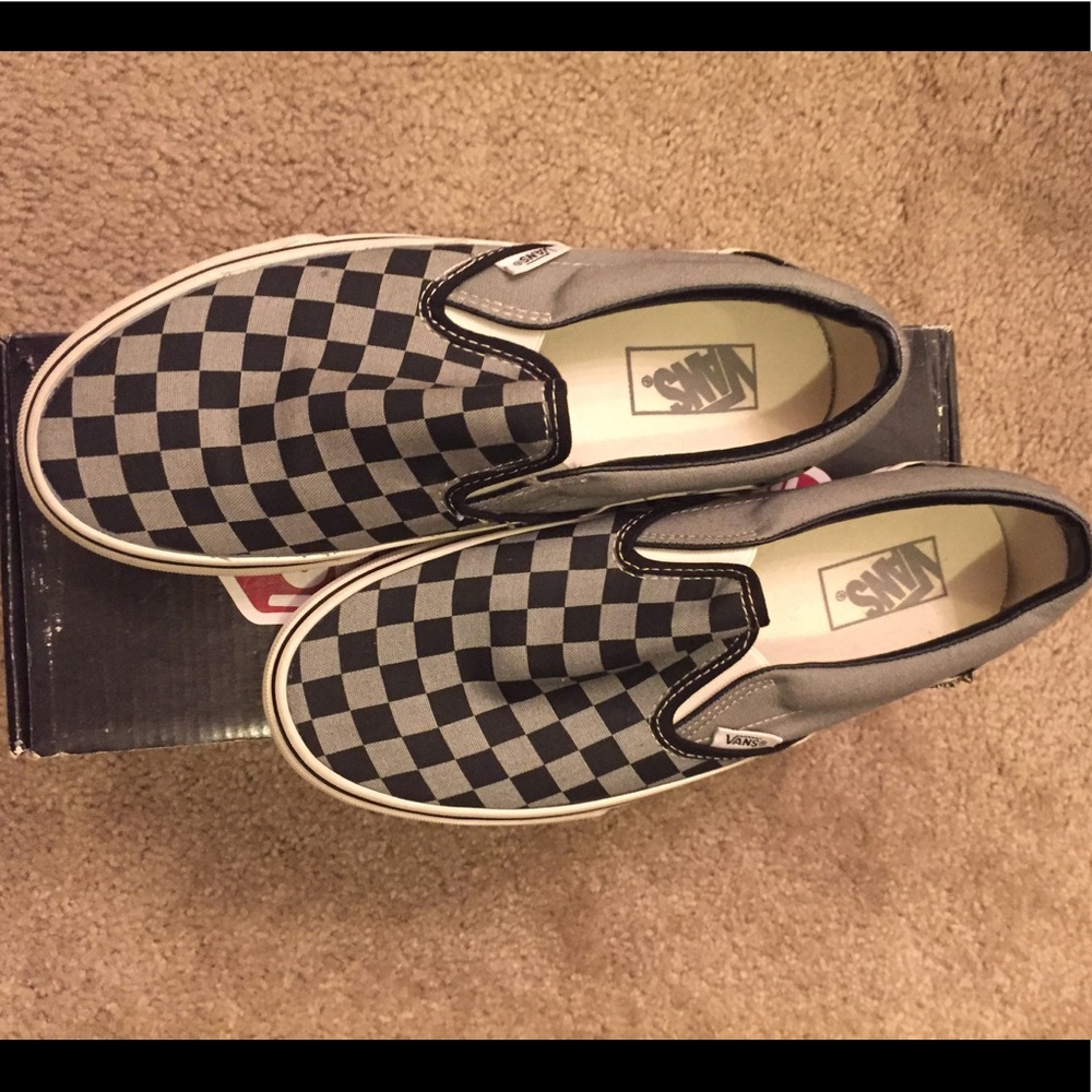 Black and gray checkered Vans