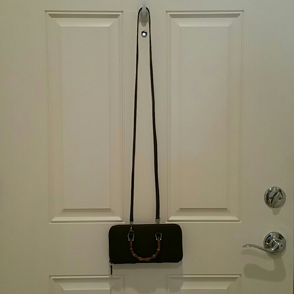 Vintage Gucci clutch / with bent bamboo handles.