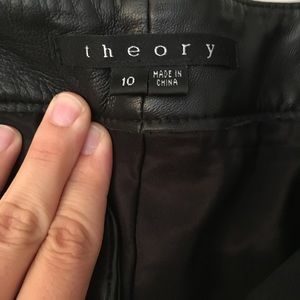 Black leather flare leg pants